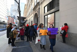 Unionized workers rallied outside of Legal Services NYC’s Manhattan office at 40 Worth St. in February amid contract negotiations. Signs read "Fair Contract Now!!"